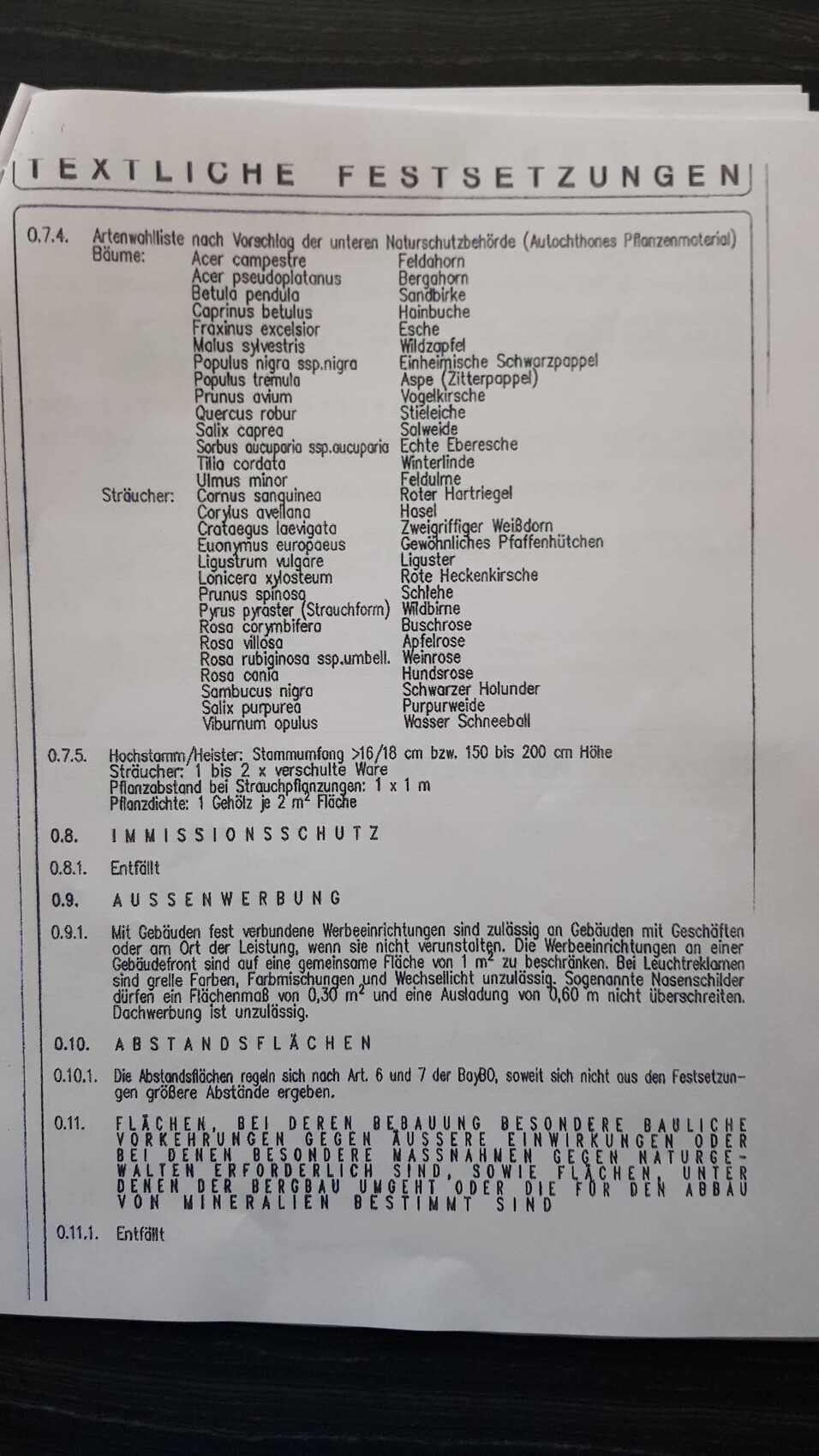 Seite eines Textdokuments mit der Überschrift TEXTLICHE FESTSETZUNGEN und Textelementen