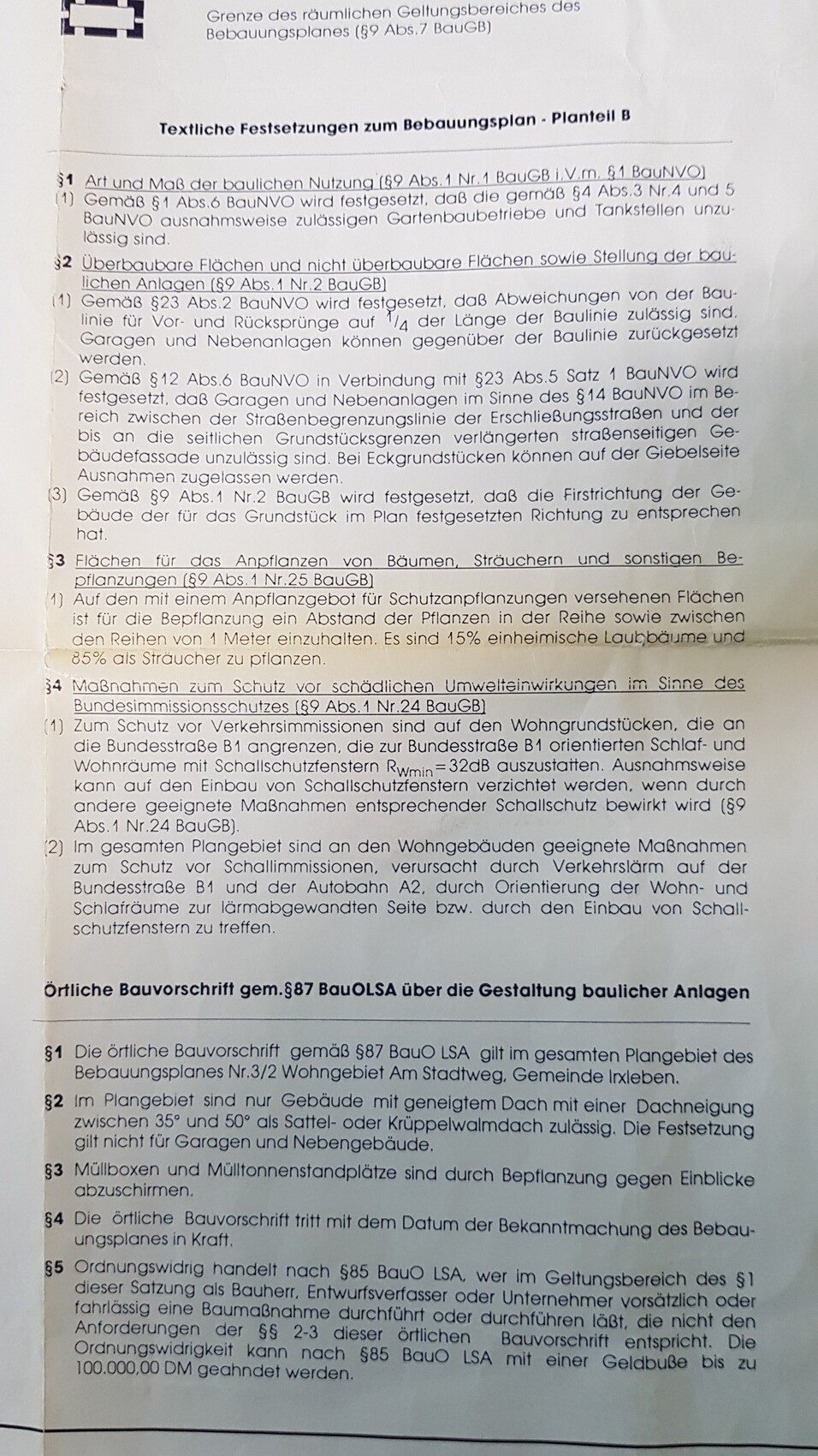 Seite eines Bebauungsplans mit Textliche Festsetzungen und Paragraphen.