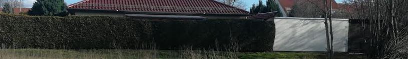 ueberbau-carport-und-zu-lange-grenzbebauung-579599-1.JPG