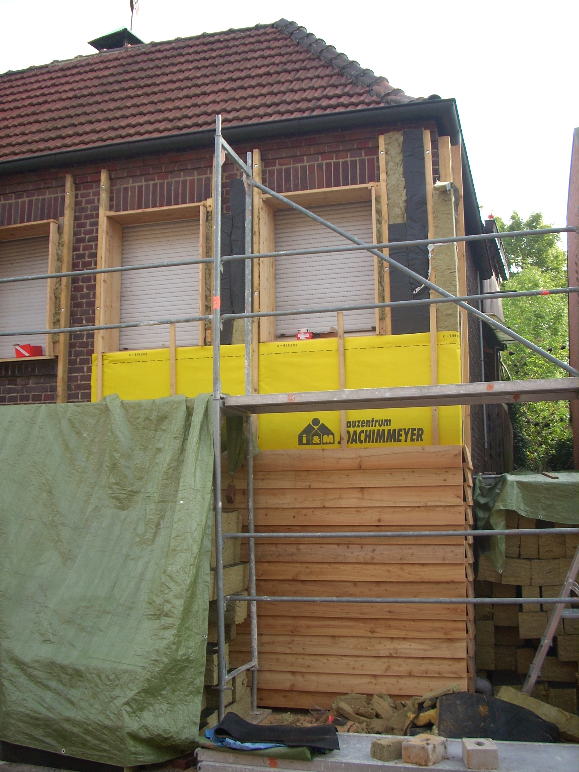 vhf-vs-wdvs-fassade-1970-altbau-betonziegel-603537-1.JPG