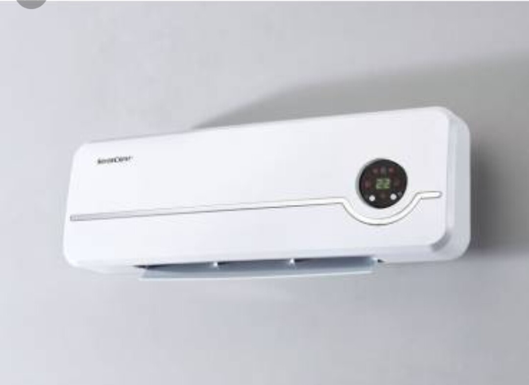 Weiße Wand-Klimaanlage (Split) mit rundem Display rechts, Anzeige 22°C.