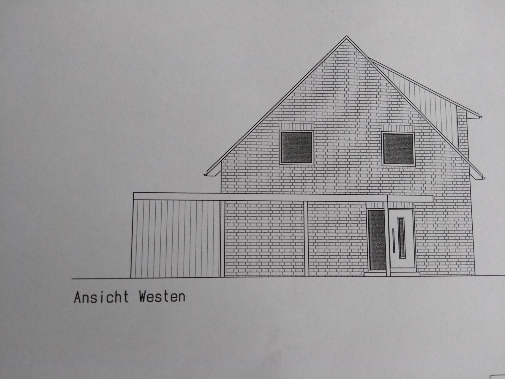 Westansicht eines zweistöckigen Backstein-Hauses mit Garage links und Eingang rechts.