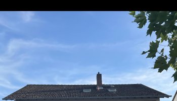 hausansicht-dachziegel-blauer-himmel.jpg